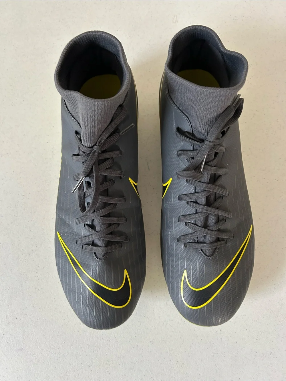 Nike Men’s Black Soccer Cleats with Yellow Swoosh